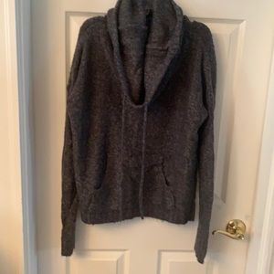 Sweater new with out tags has pockets like a poncho in front and turtle neck